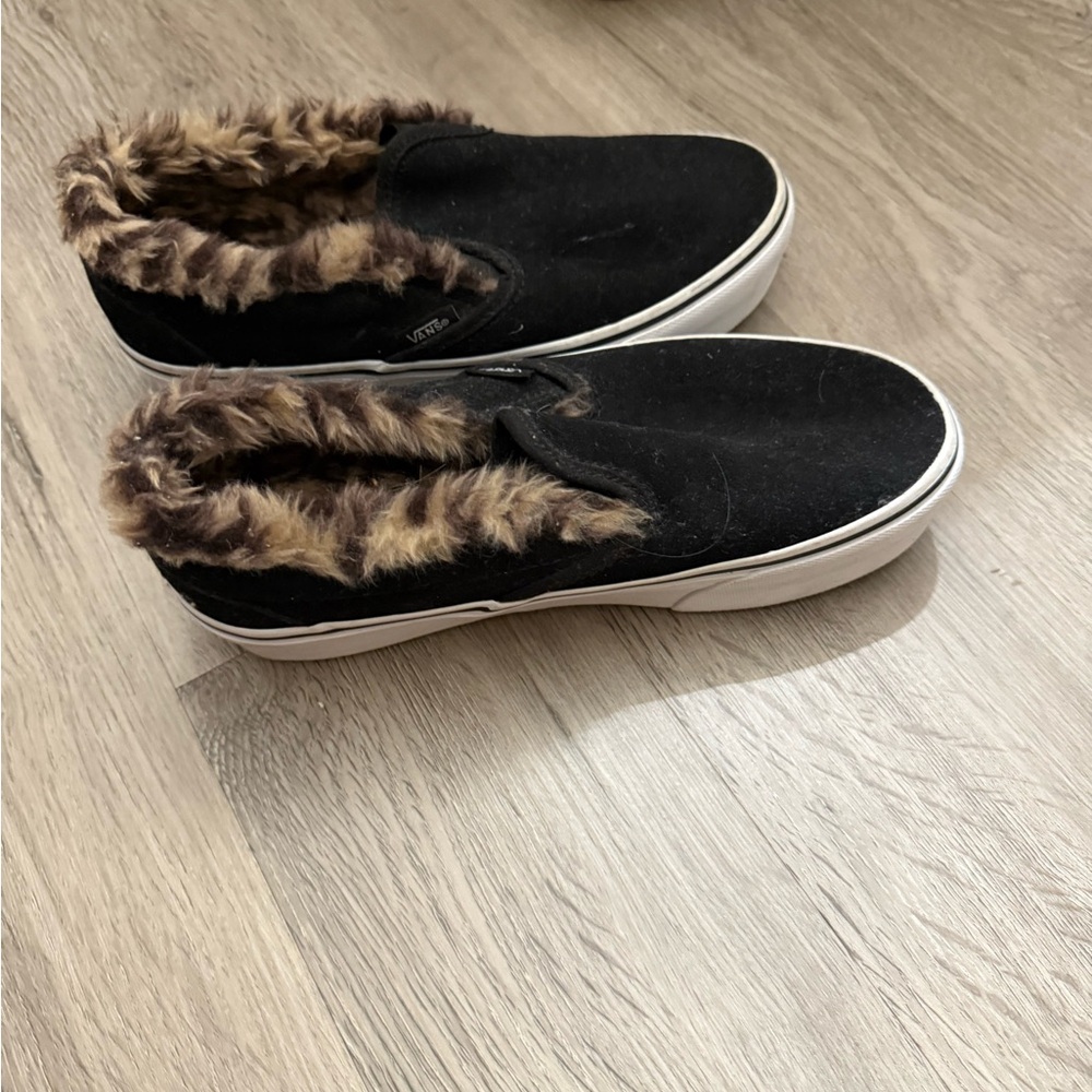 Vans 
Leopard fur print on back of shoe. Brand new never worn.